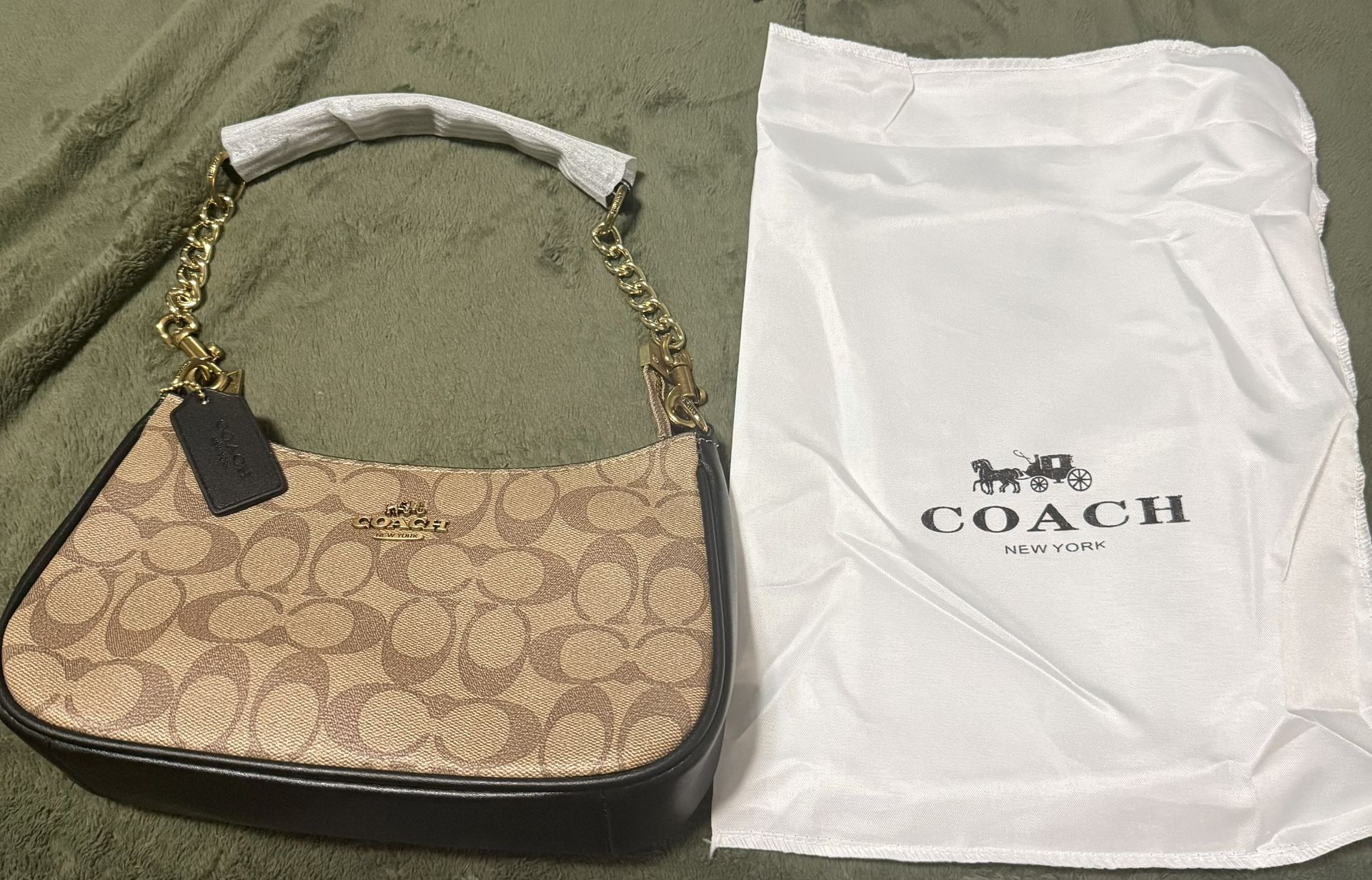 Coach Teri Shoulder Bag in the classic black/brown signature canvas