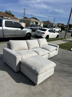 Beige Sectional Cloud sofa modular Ashleys furniture