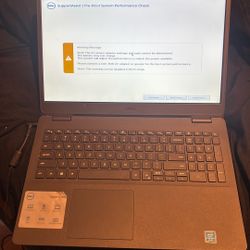 DELL Laptop With A Warning Message 