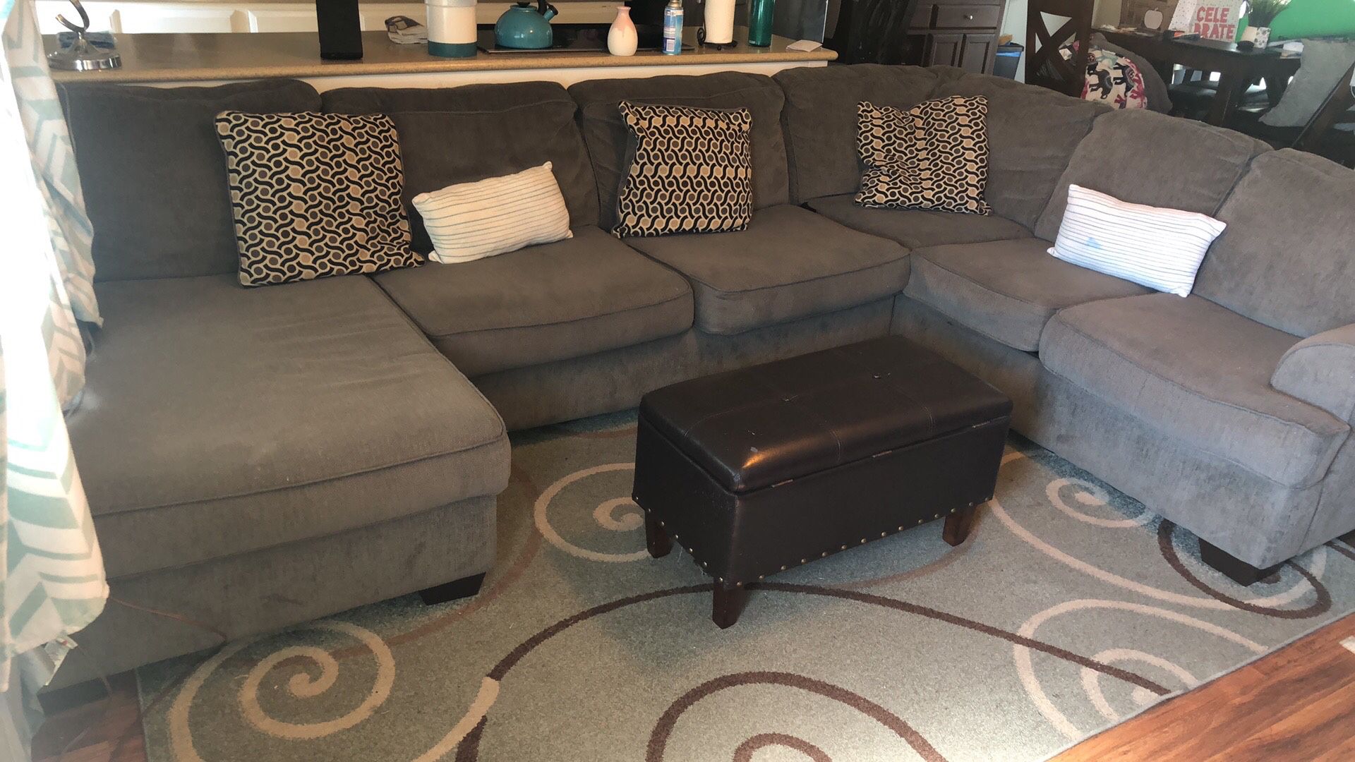 Gray couch with ottoman