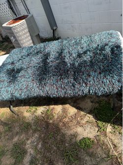 Brown & Teal Area Rug. 36”x60”