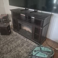 100.00 - Solid Wood Fireplace / TV Stand 