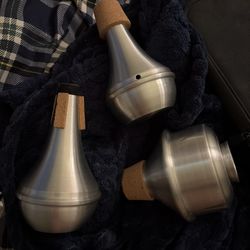 Silver Besson Trumpet w/ essential elements book and 3 different cup mutes