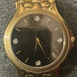 Wittnauer men's Savoy diamond accent watch in gold tone with a black