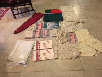 Beautiful Christmas table cover,tablecloths, runners.Sombra new, some Lacey. Tripod.