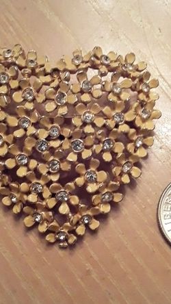 Goldtone Heart Shaped Broach. Paved With Tiny Posies With A Crystal In Center. Stamped KRAMER Of New York.