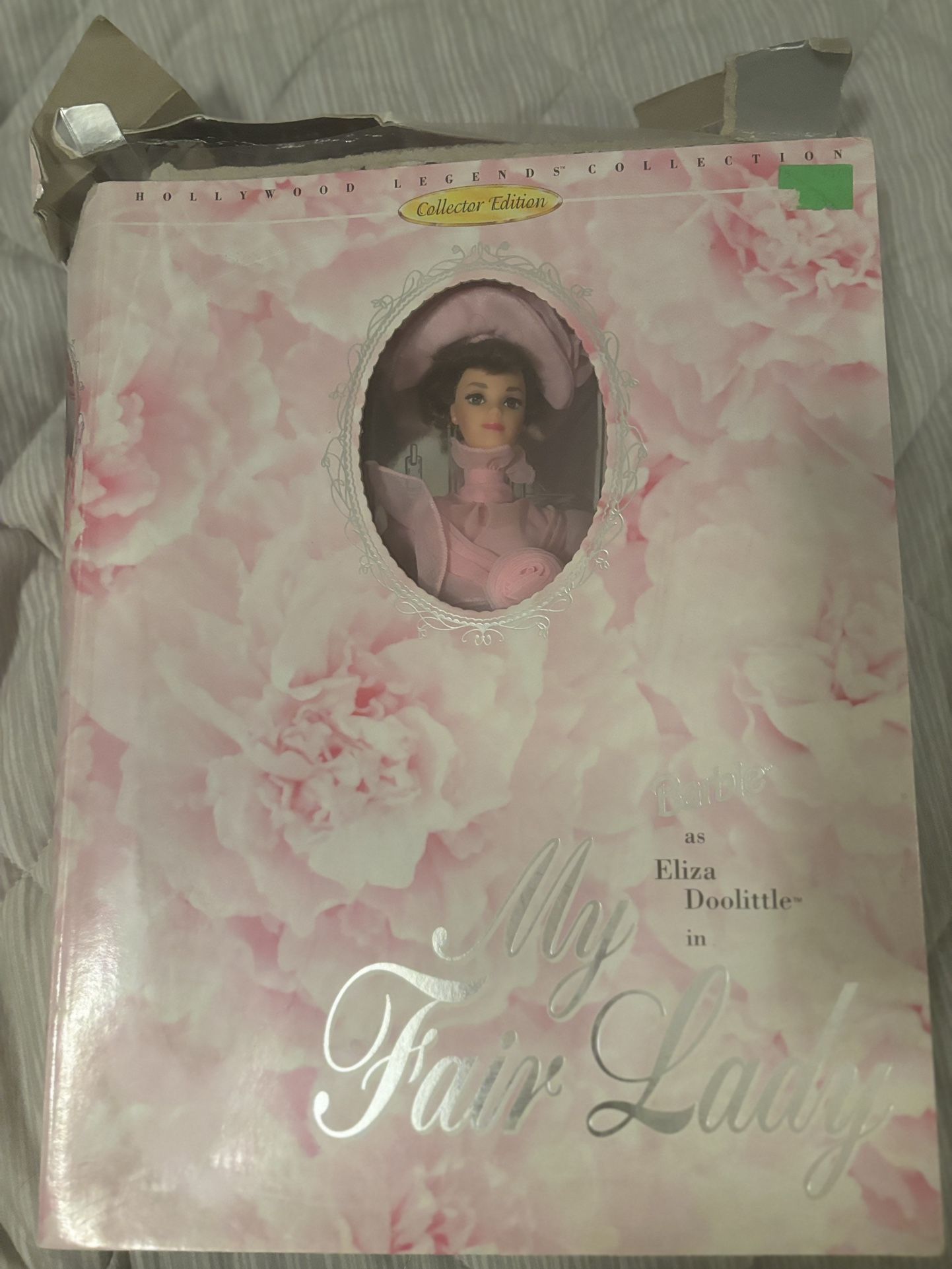 This is the My Fair Lady Barbie from the Hollywood Legends Collection by Mattel, featuring Eliza Doolittle in her stunning pink Ascot gown. The dress