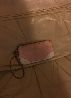 Pink coach wristlet