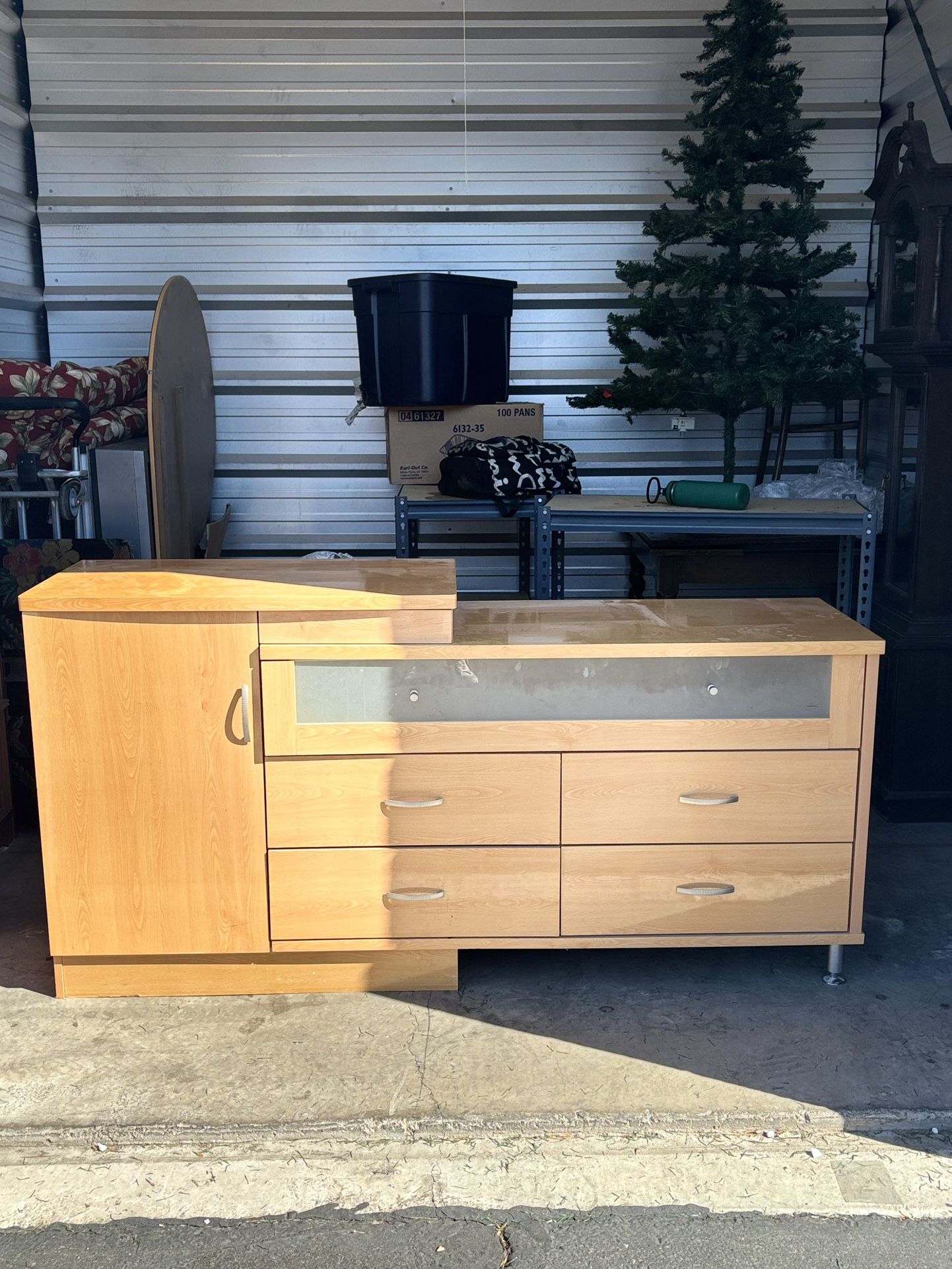 Beautiful solid wood dresser with a cabinet and Five drawers. 