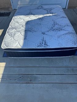 Queen Pillow Top Mattress with Box Spring new has a little dirt on the side from moving it
