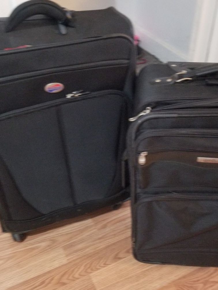 2 black Suitcases