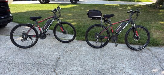 two electric bikes, come with batteries