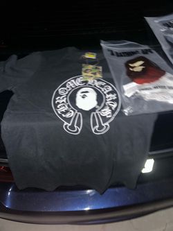 Cool chrome hearts tee shirt with baby milo on the back