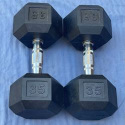 PAIR  OF  35 LB.  NEW  RUBBER  DUMBBELLS