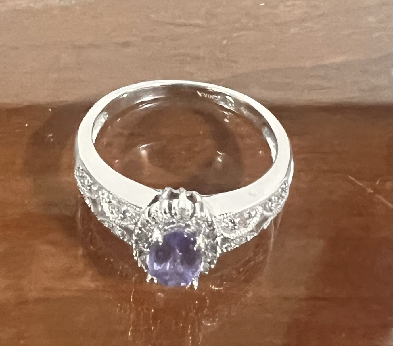 14K WHITE GOLD RING WITH PERIWINKLE STONE AND DIAMONDS. 14k stamp on. Size 6.