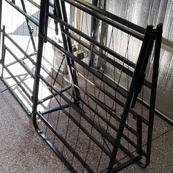 Fold up bedframe. Two twins or one queen combined.