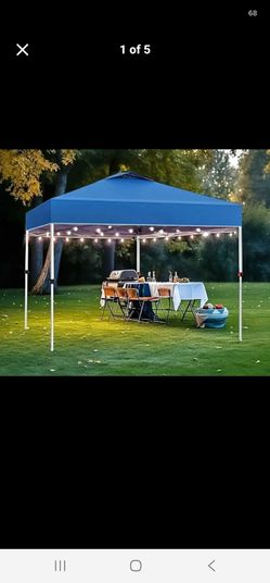 10 ft. X10 ft. Golden Bear Newport 100 insteat canopy  tent .( tent + carry  bag on wheels & box)