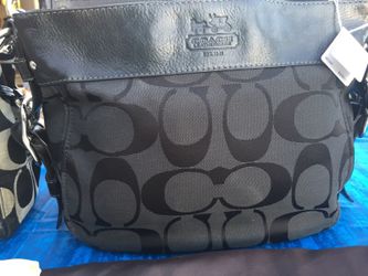 Coach "Zoe" signature handbag