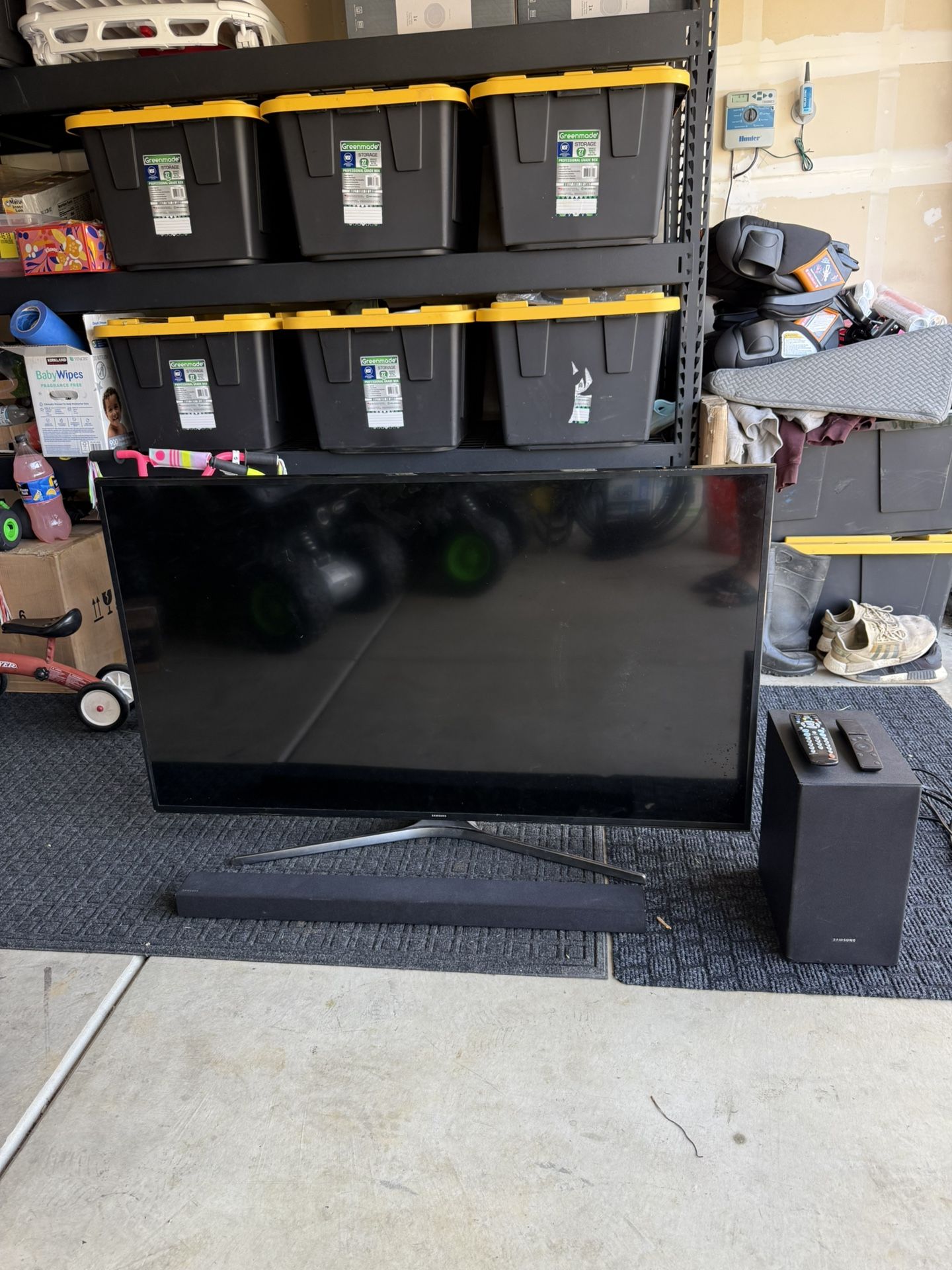 55in” Samsung smart TV with a nice Samsung soundbar system