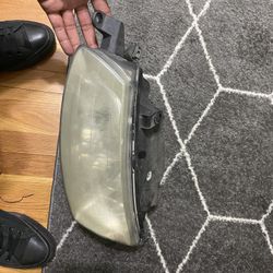 2000-2001 Toyota Solara Left And Right Headlight Lamps With Bulbs