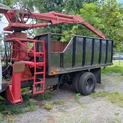 Grapple truck body dump. Tree Work Etc.