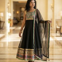 Black Salwar Suit with Green Embroidery, Gold Zari Border & Net Dupatta