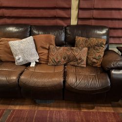 Well Worn Leather Couch With Power Recliners