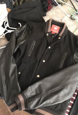 Black leather jacket hardly used.