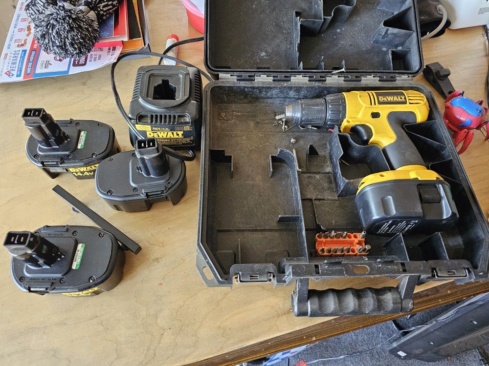 Dewalt Drill 14.4v With Case, Charger, and extra batteries.
