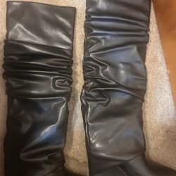 black heeled cuff over boots 