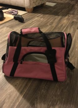 Pink small dog carry on