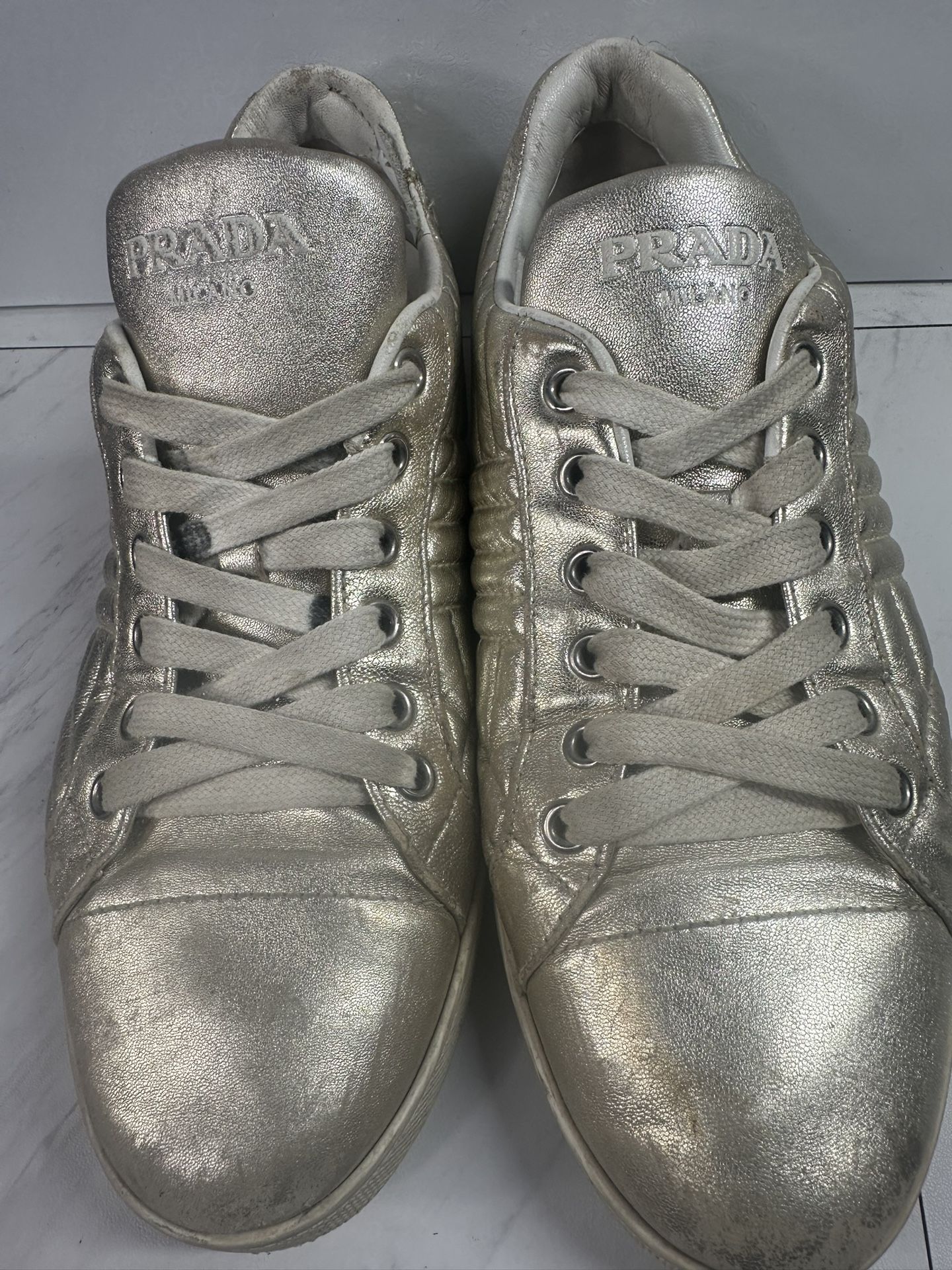 Prada Diagramme Quilted Low Top Sneakers Gold Metallic Leather