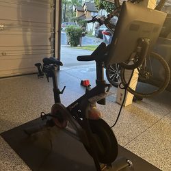 Peloton Bike with Mat, Shoes, And  Weights