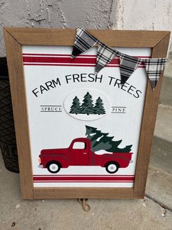 Farm Fresh Trees" holiday wall sign featuring a classic red truck