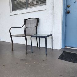 Cheap One person patio set you get a old porch chair and a drink table perfect for apartment or condo
