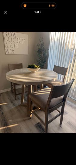 Round high top dining table + 3 chairs