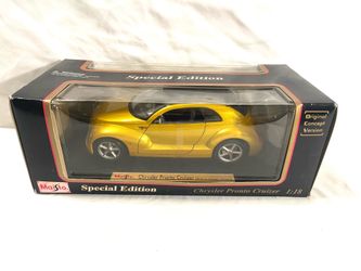 Mint condition 1990s scale 1/18 diecast (Maisto) Chrysler pronto cruiser.