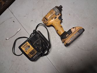 Impact drill with charger and battery