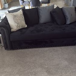Velvet Black Tufted Sectional with Silver Trim