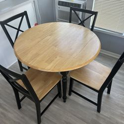 Round / Rectangle 40”  Table w/ 4 chairs light maple w black trim  