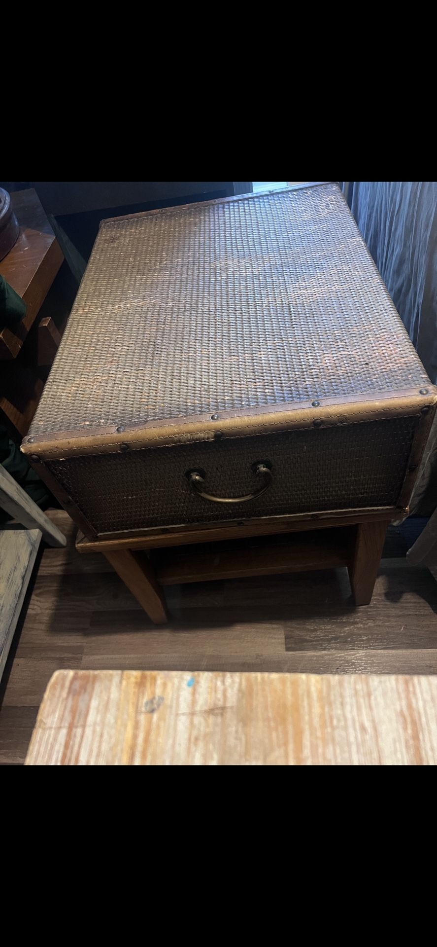 E Cane & Leather Trunk with felt lined drawer on a wood side table