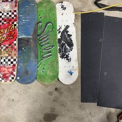4 Skateboard Decks And 2 Brand New Grip Tapes