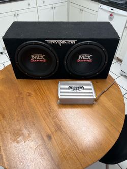Dual MTX audio subwoofer with Boss audio mono-block amplifier