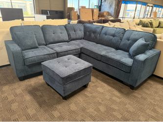 Navy blue sectional and ottoman