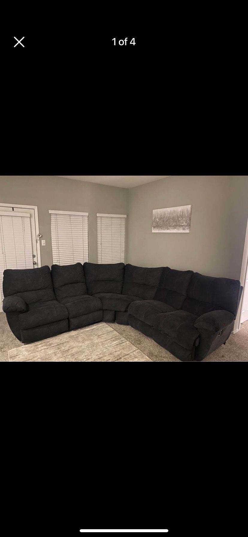 Dark Blue Couch With Recliners At The End