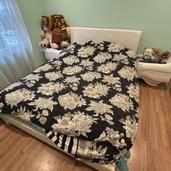 Queen White Bed Frame with Floral Bedding