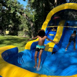 Inflatable with waterslide/pool