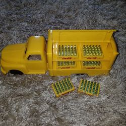 Vintage Coca-Cola truck with bottles