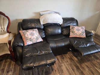 Free leather couch has wear