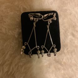 Silver Long Clip On Earrings With Dangling Charms